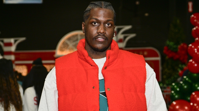 Lil Yachty wearing a red vest
