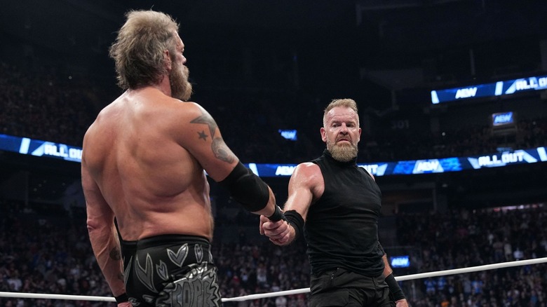 Cope shakes Christian's hand