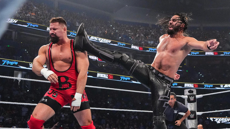 Seth Rollins kicks Bron Breakker in the face