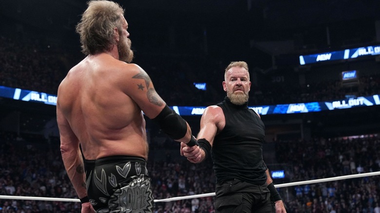 Cope and Christian shake hands
