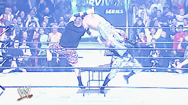 The Dudley Boyz put Rico through a table