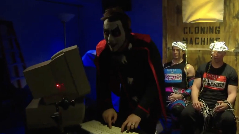 Danhausen in his lab with Kit Wilson and The Miz