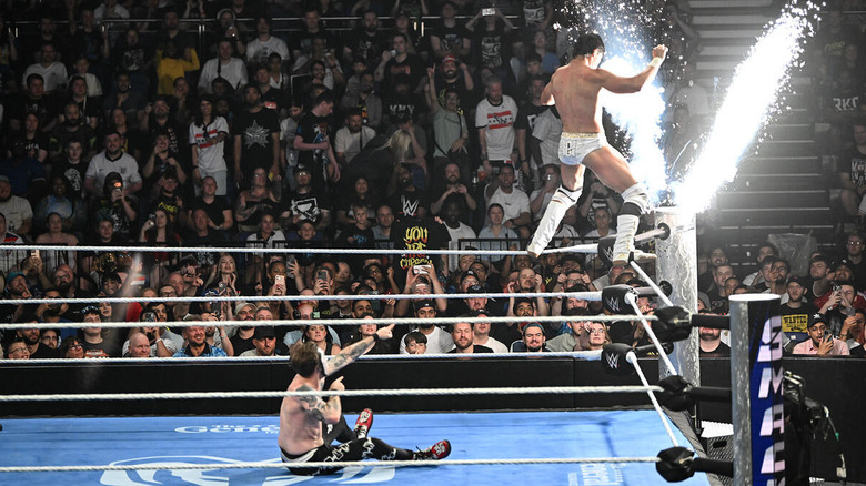 Danhausen points at Berto while pyro goes off as he stands on the top rope on "WWE SmackDown"