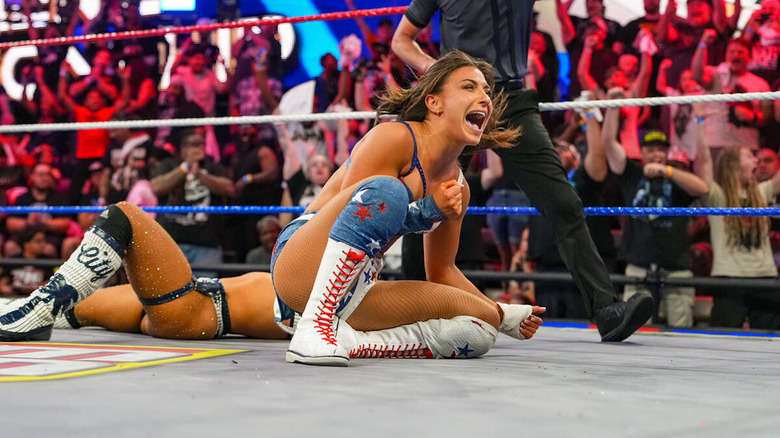 Kendal Grey celebrates winning the women's title.