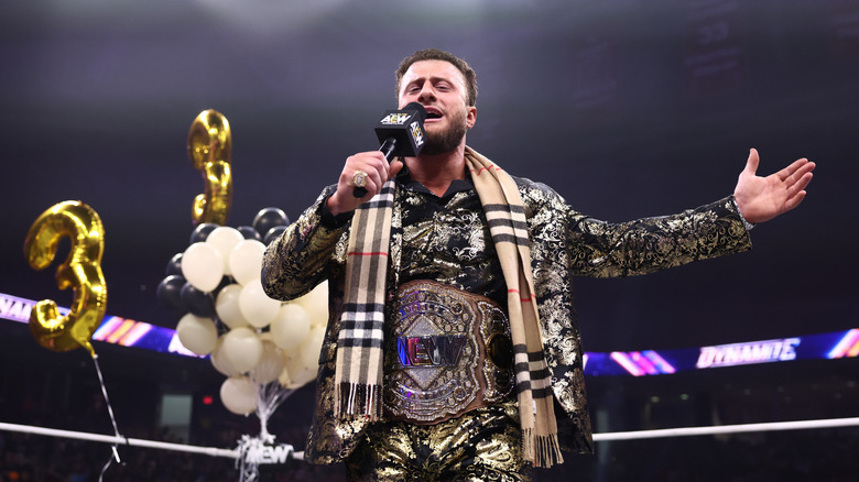 MJF celebrates his third reign with the AEW World Championship, title around his waist, in the ring during the May 27, 2026 edition of "AEW Dynamite."