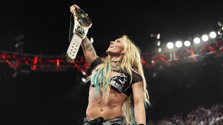 Sol Ruca holds up her women's Intercontinental Championship on "WWE Raw"