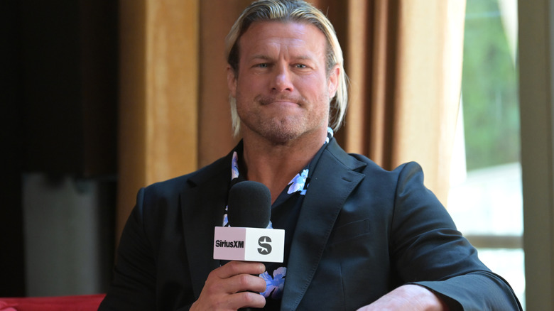 Nic Nemeth holding a microphone