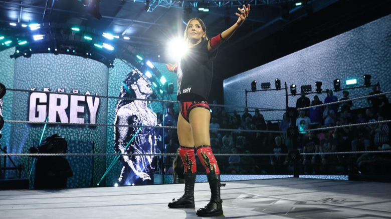 Kendal Grey poses in the ring during her entrance ahead of a match against Kelani Jordan on an episode of "WWE NXT."