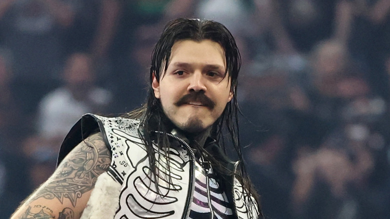 Dominik Mysterio posing for the people