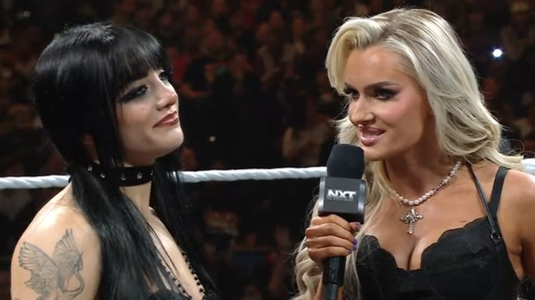 Blake Monroe speaks to Tatum Paxley as Paxley looks on, unimpressed.