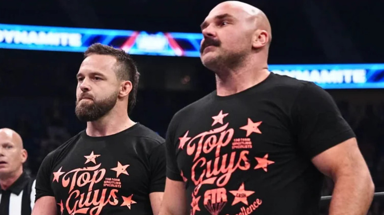 Cash Wheeler and Dax Harwood wearing black t-shirts