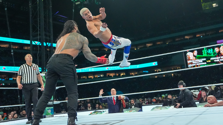 Cody Rhodes delivers a Cody Cutter to Roman Reigns