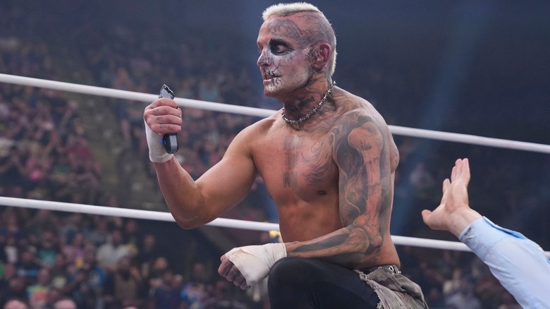 Darby Allin wields a set of clippers