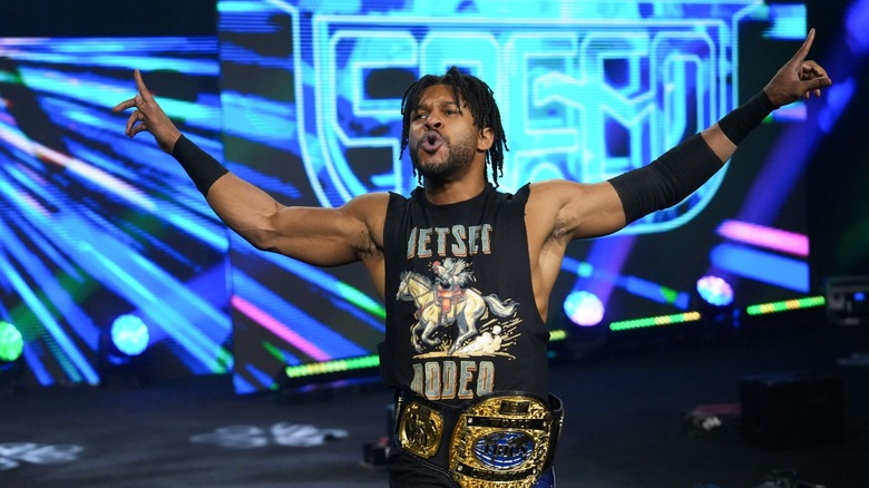 Kevin Knight holds the AEW Trios Title