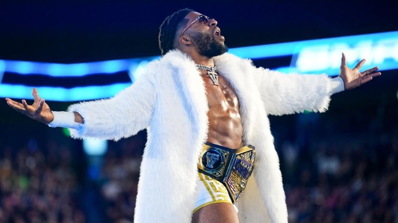 United States Champion Trick Williams poses for the crowd, title around his waist, ahead of a match on a May 2026 edition of "WWE SmackDown."