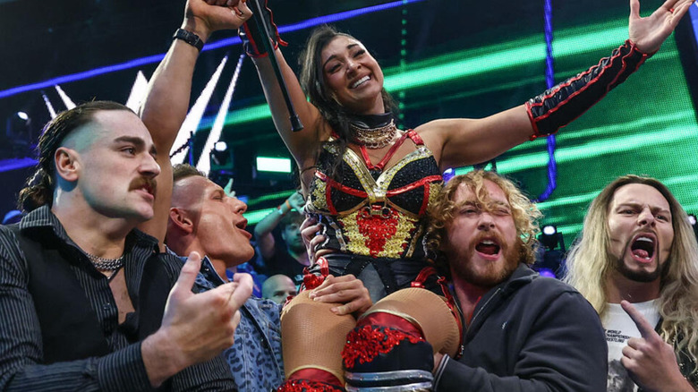 Arianna Grace being hoisted up by Birthright