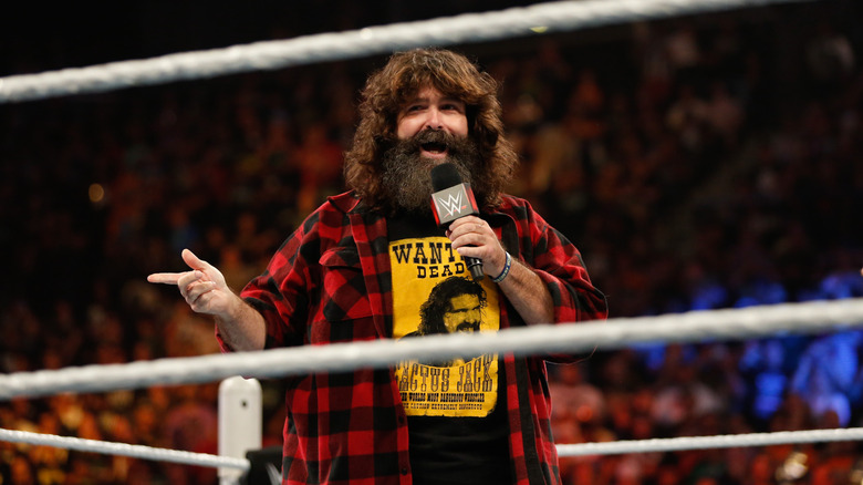 Mick Foley greets the audience at WWE SummerSlam 2015 at Barclays Center of Brooklyn on August 23, 2015 in New York City.